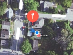 An overhead map shot showing GPS of a home and a person's location.