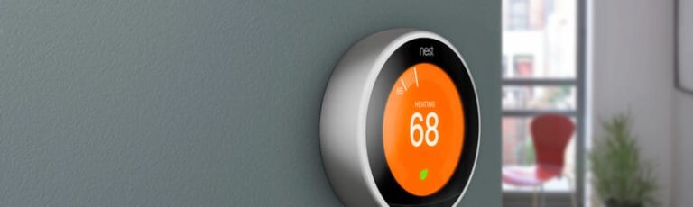 Nest smart thermostat illustrating Vivint's smart home integration capabilities.