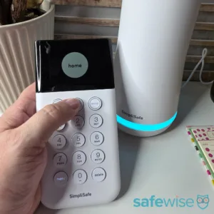 Arming the SimpliSafe keypad during testing.