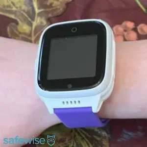 COSMO watch with purple band on a young girl's wrist.