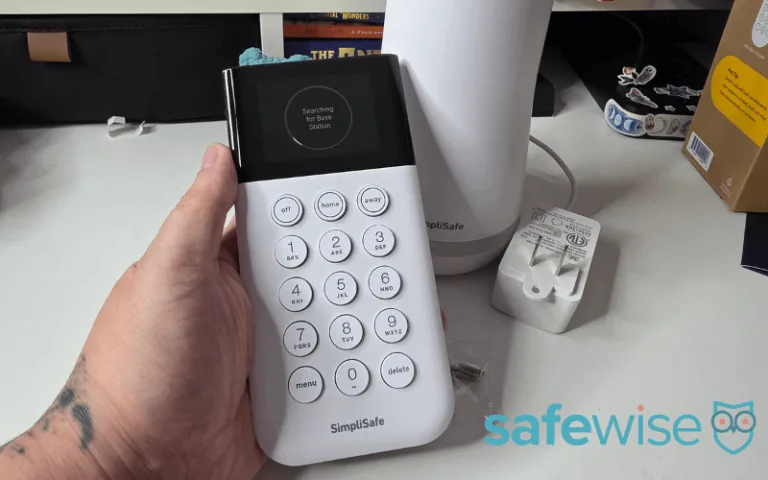 Alina installing the SimpliSafe base.