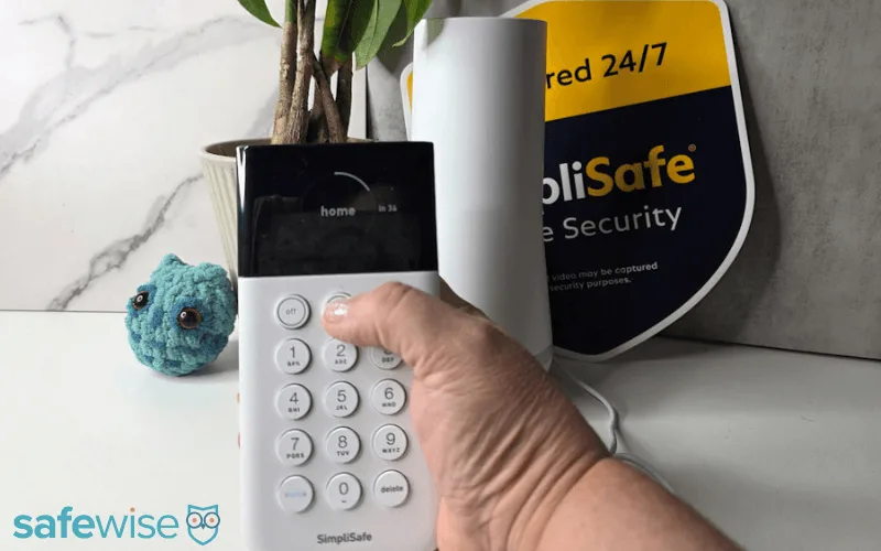 Setting up the SimpliSafe system using the keypad.