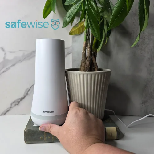 The SimpliSafe base is long with a light at the base.