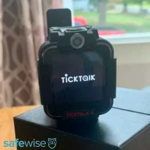 TickTalk watch on startup screen, sitting on a box.